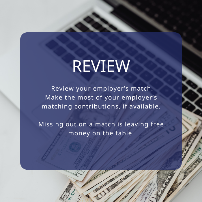 money and laptop on a desk